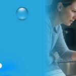 Woman inspecting discolored tap water in a kitchen sink highlighting the importance of professional plumbing inspection services