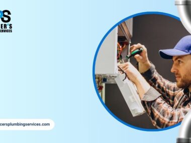 Plumber performing maintenance on a residential water heater in Houston home